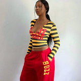 Women’s Striped Graphic Print Long Sleeve Fitted Crop Top