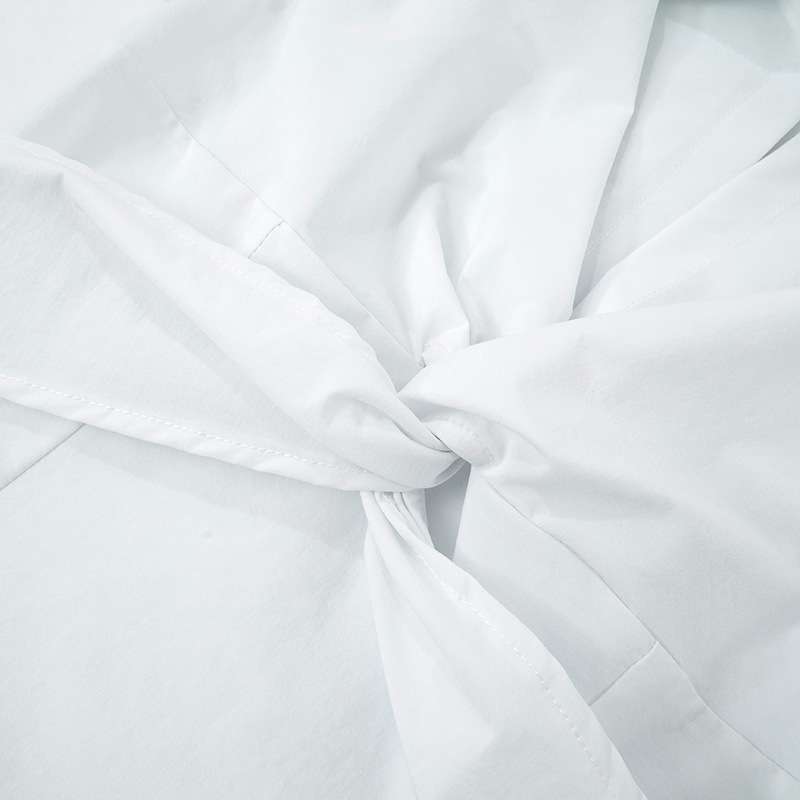 Sleeveless Twist-Front Blouse with Structured Details image 7