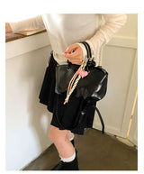 حقيبة يد مزينة بسحر ملون