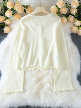 Elegant Cardigan with Floral Embellishments image 3