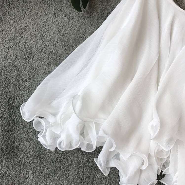 Sleeveless Top with Ruffled Hem image 2