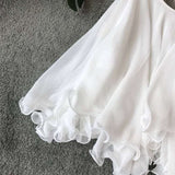 Sleeveless Top with Ruffled Hem image 2