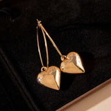 Gold Heart Charm Hoop Earrings image 0