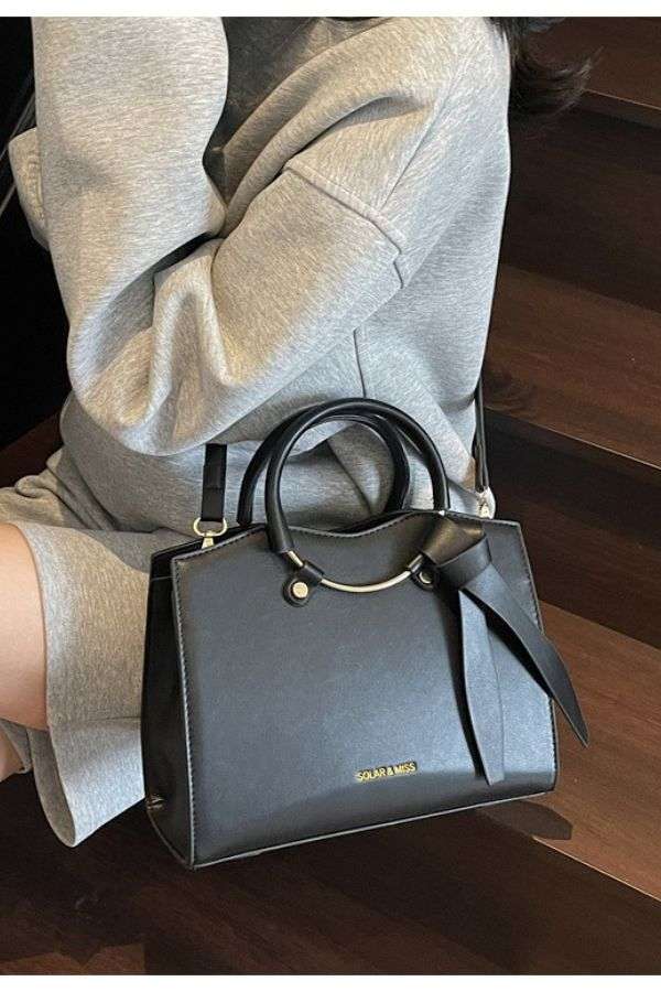 Structured Handbag with Knotted Strap image 0