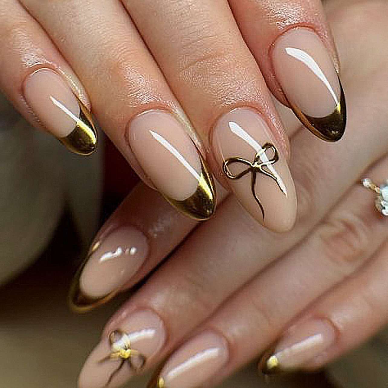 Gold Chrome Bow Accent Almond Press-On Nails image 1