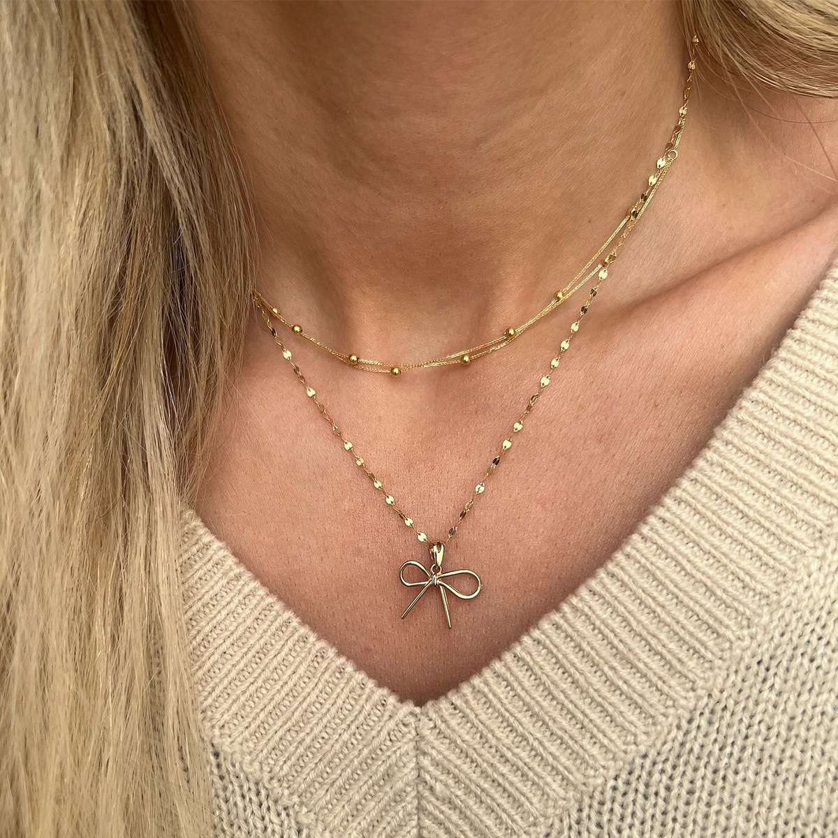 Elegant Gold Bow Pendant Necklace with Layered Chains image 4