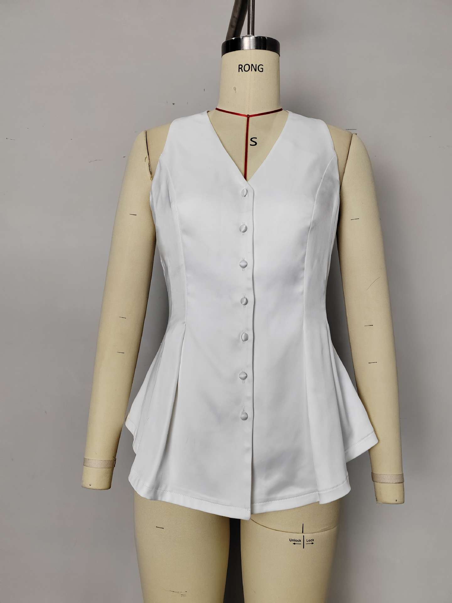 Sleeveless Peplum Top with Button Detailing image 2